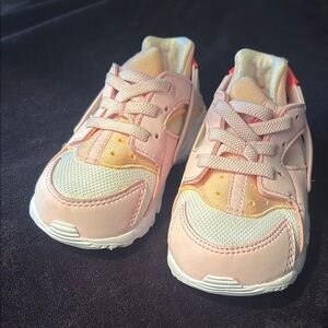 Kids Pink and White Nike Sneakers